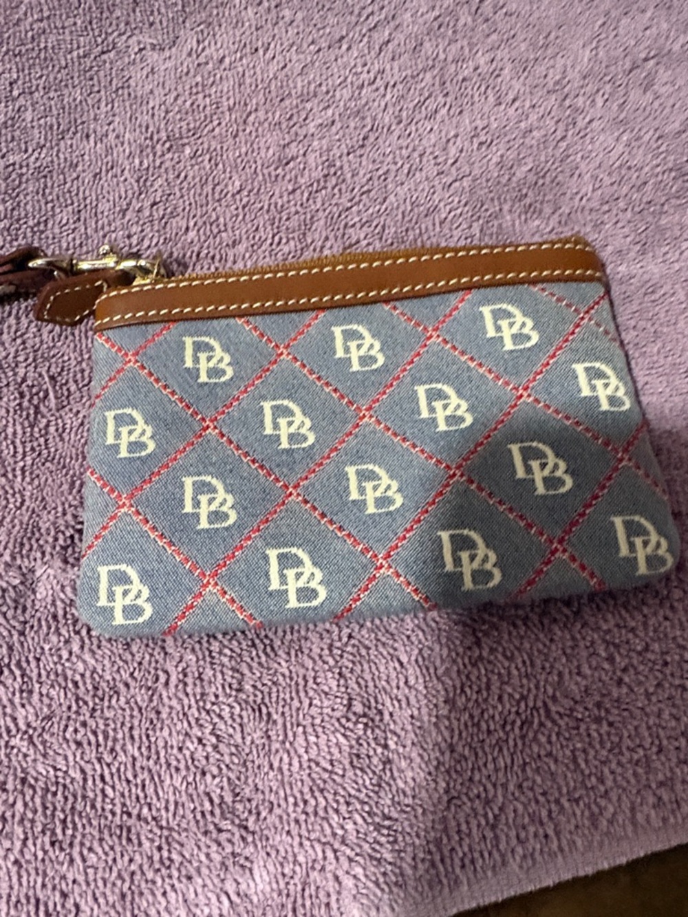 Dooney & Bourke Blue Monogram Wristlet with Tan Trim